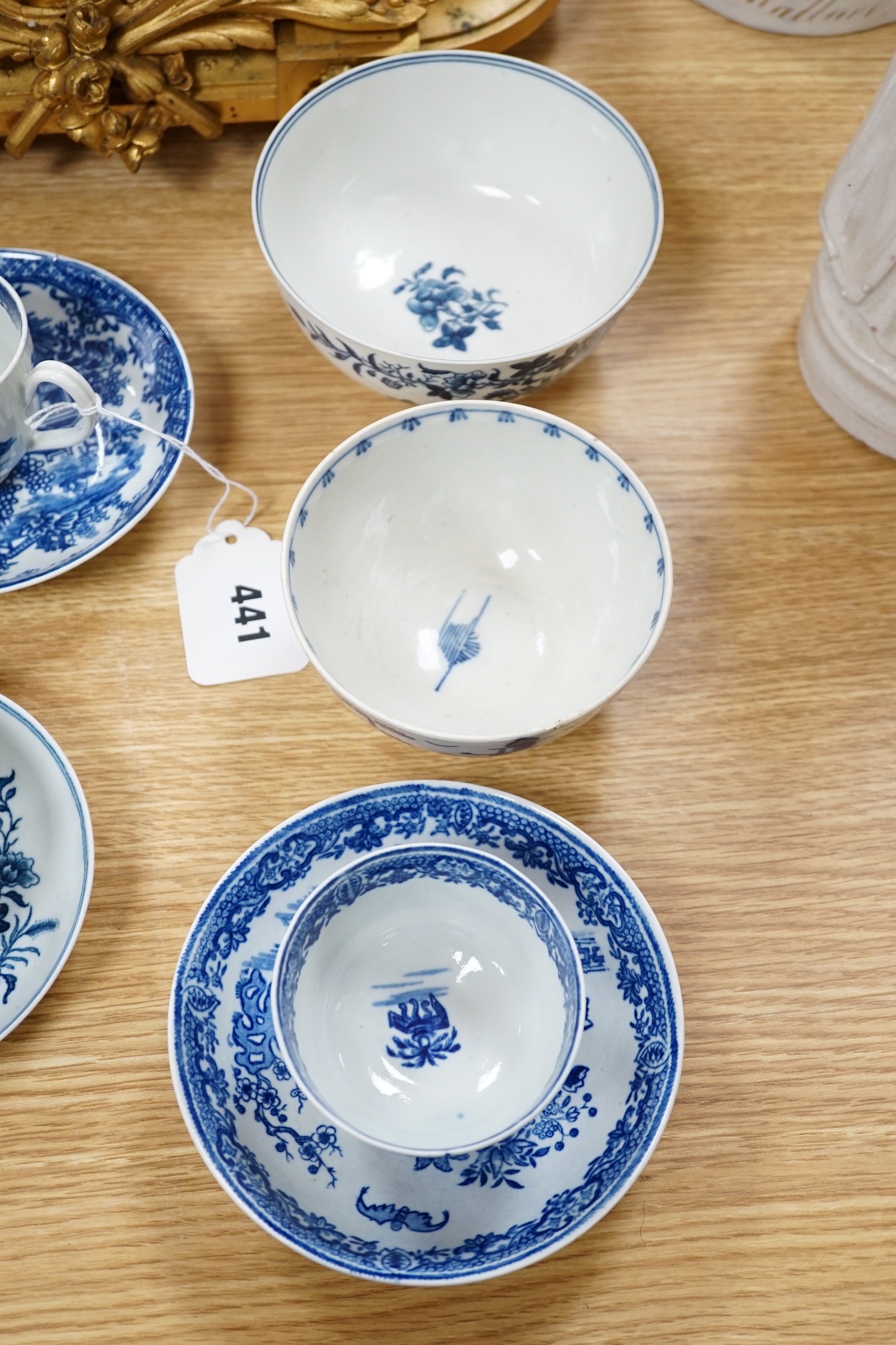 A Worcester teabowl and saucer printed with the Bat pattern, a coffee cup and saucer with the Argument pattern, another with the Fence pattern and a similar bowl and a very interesting pearlware bowl